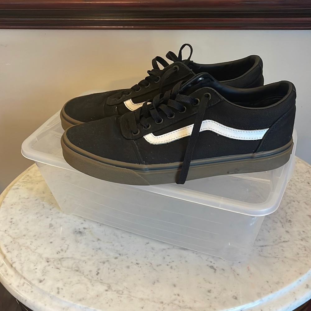 Vans black and white sneakers in men’s size 9.
